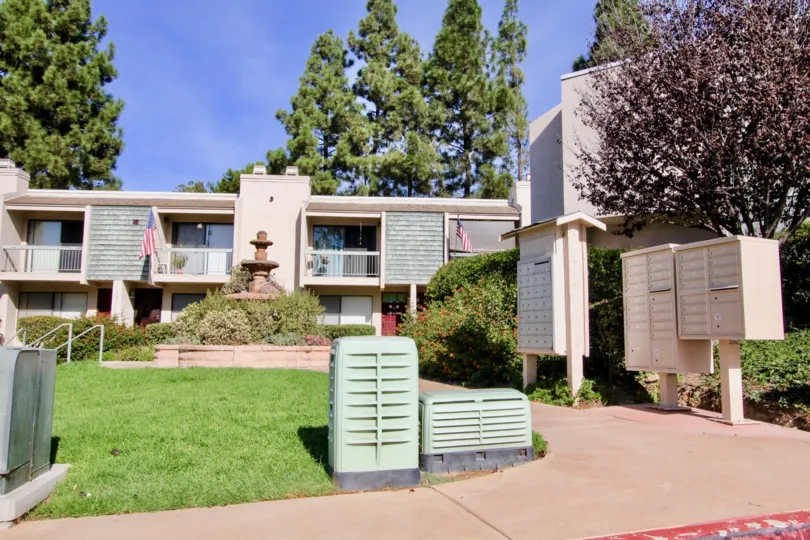 Pacific Racquet Club, Balcony, sliding glass doors, manicured landscaping.