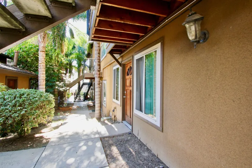 Courtyard and first level entrance for Adelaide Gardens apartments in College Area California