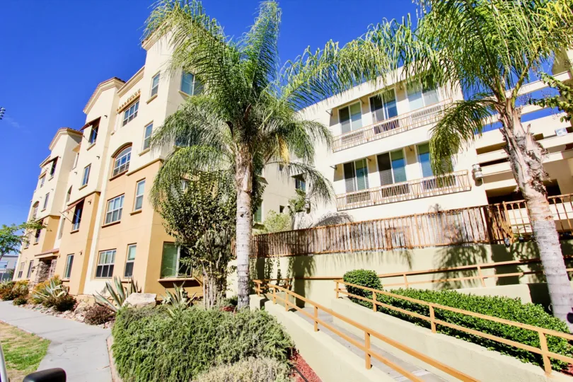Four story housing units with walkway at Campus Walk in College Area California