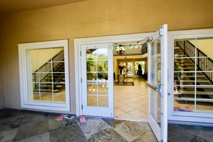 Large white doorway entrance at Carriage House in College Area California