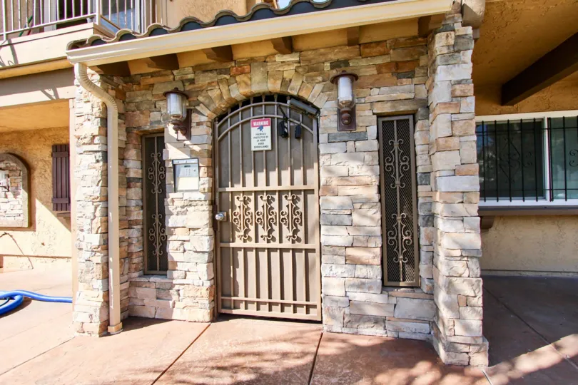 Excellent design of a front gate with lamps of a Hosue in City Courtyard of College Area