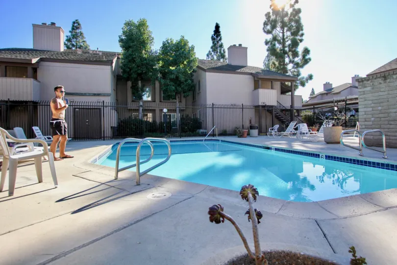 College Grove Village  , College Area. California, swimming pool,, man