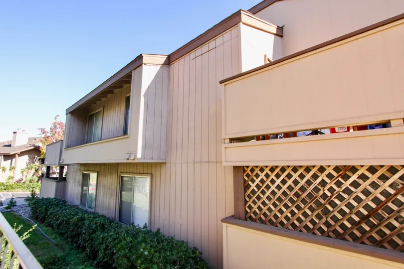 A two level apartment building in College Grove Village in College Area, California.