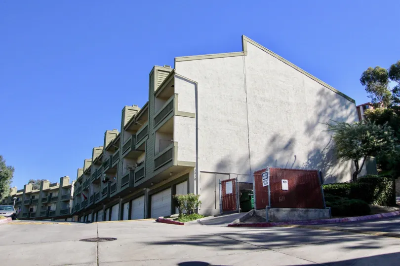 The street leads up to the building of College Park Townhomes in California.
