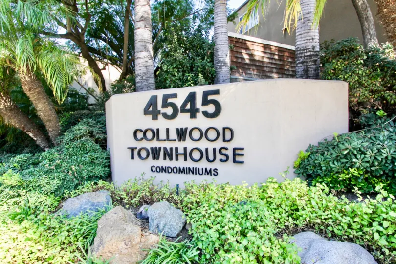 The Collwood Townhomes is covered by full of lush green grass and trees