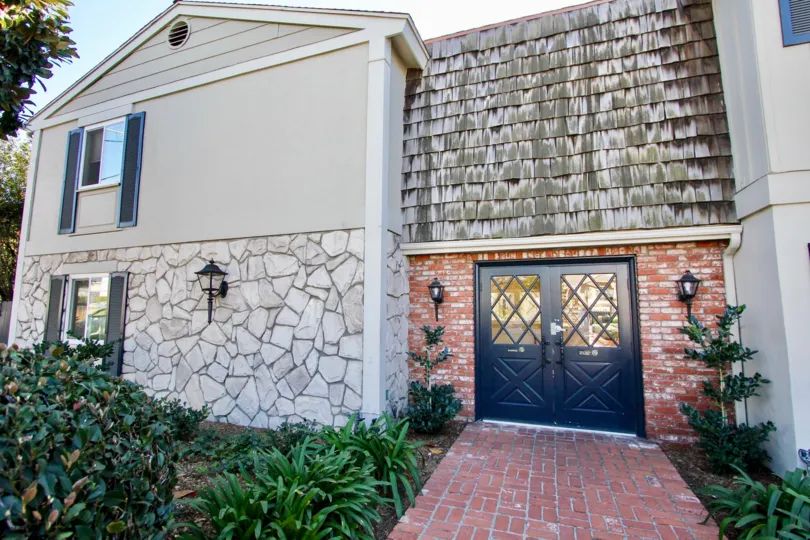 Colonial House,College Area, CA. Two story with brick, masonry and shingles.