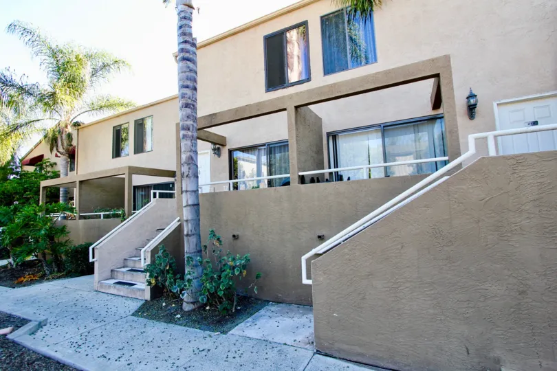 Residential units with attached stairways at Glenridge in College Area California
