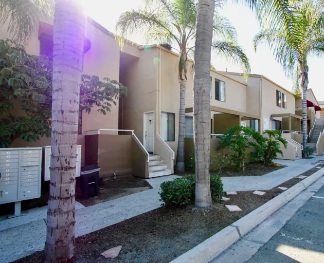 Sidewalk along two story residential buildings at Glenridge in College Area California