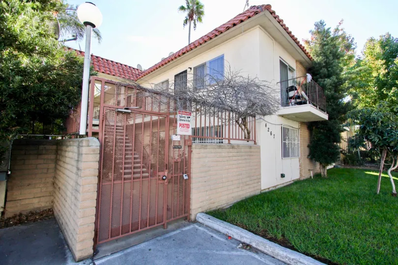 A nice cream colored house in Hoover Heights, College Area, California.