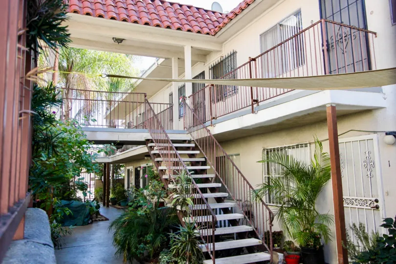 Red-tile-roof house, white sandstone  in Hoover Heights, College Area California