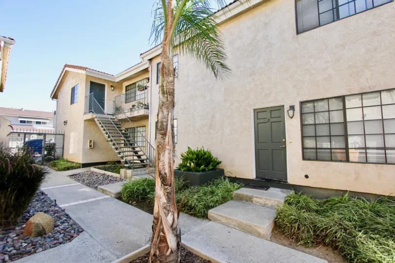 Two story townhomes with walkway at Isabella Park in College Area California