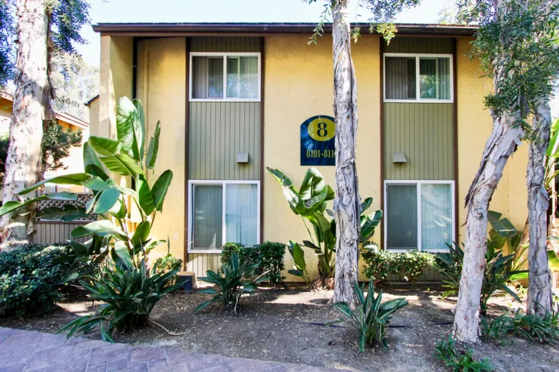 #8, a yellow, 2 level villa in Lake Park Villas in College Area, California.