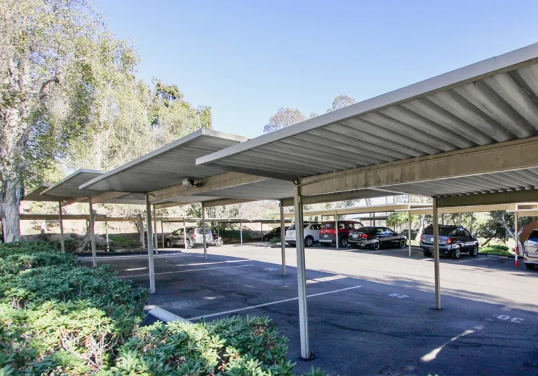 Two Story Condo with Fenced Patios and carport Close to Shopping, Eating Entertainmen