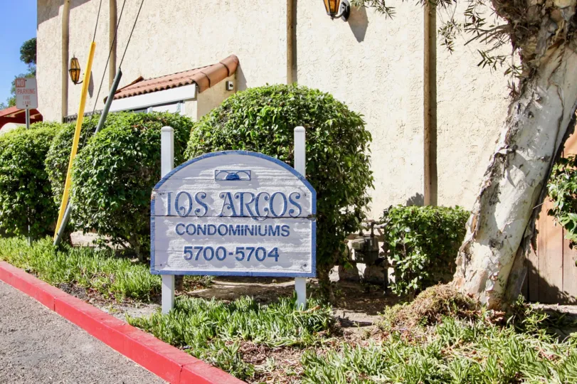 The Los Arcos with name board in the front side and lots of greenary around