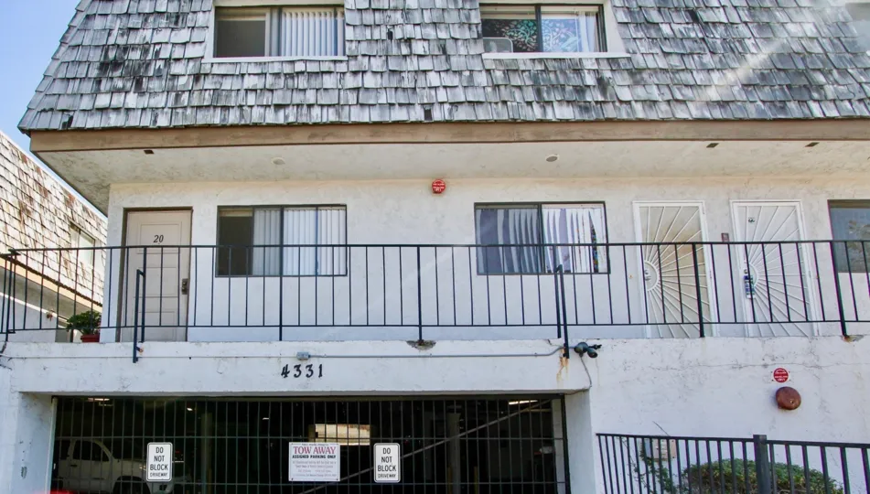 Multiple story housing with underground parking at Mediterranean Villas in College Area California