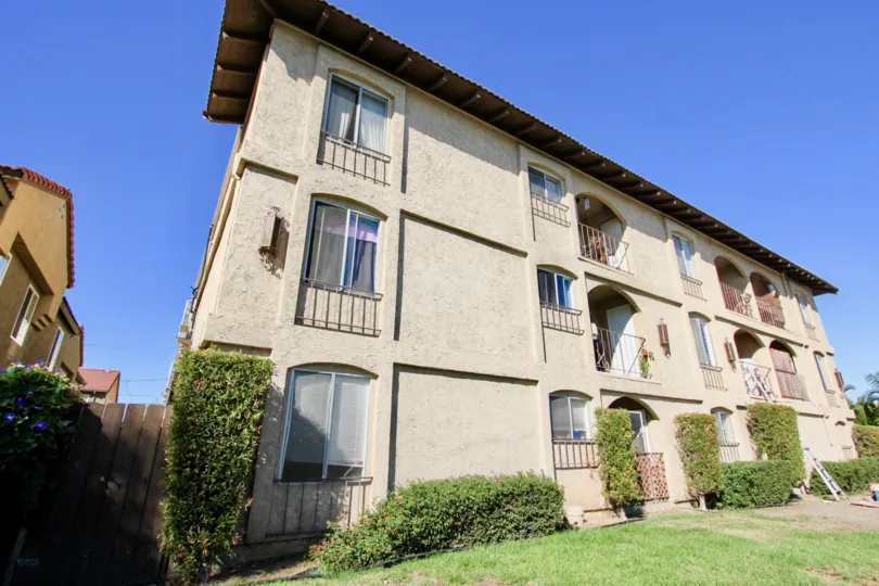 Three story residential building at Menlo Ave Condos in College Area California