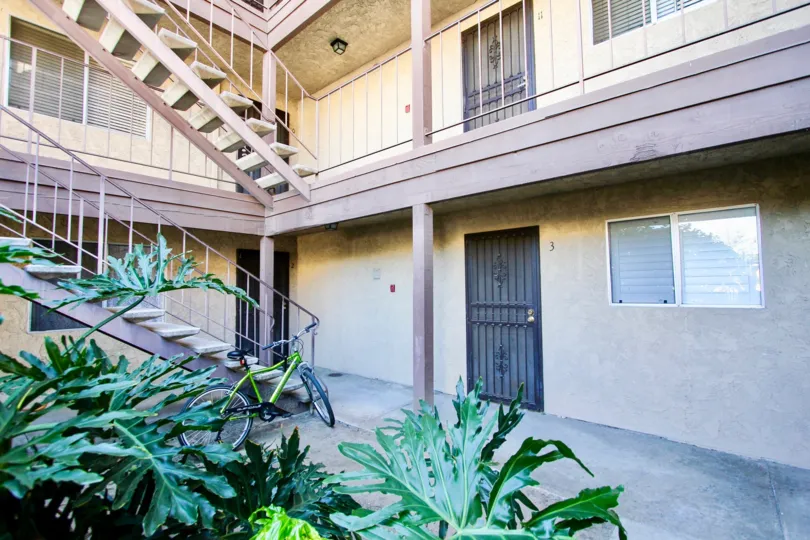 rear doors and stairs of Menlo Ave Condos in College Area California