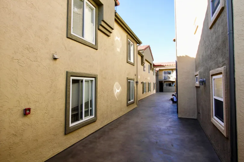 Alleyway between residential buildings at Menlo Village in College Area California