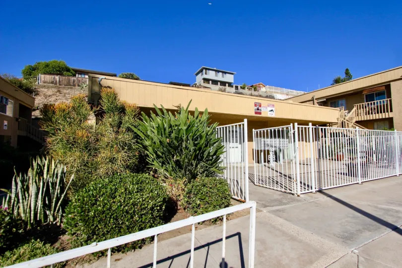 Security entrance surrounded Residential units at Mesa Greens in College Area California