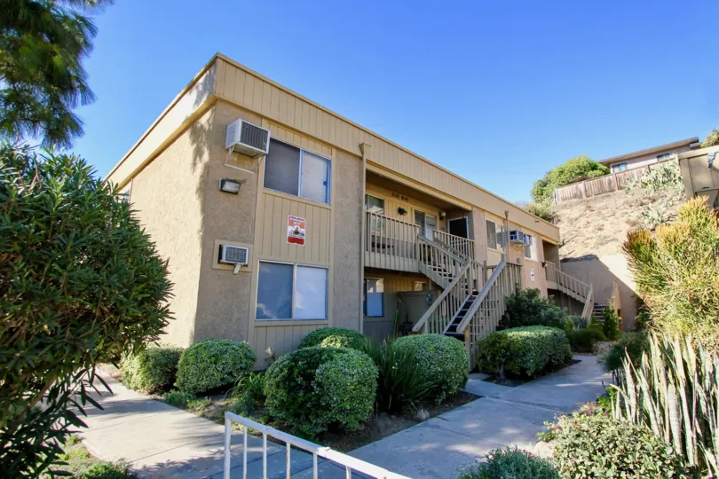 The sun lit courtyard of the Mesa Greens residences located in College Area, California.