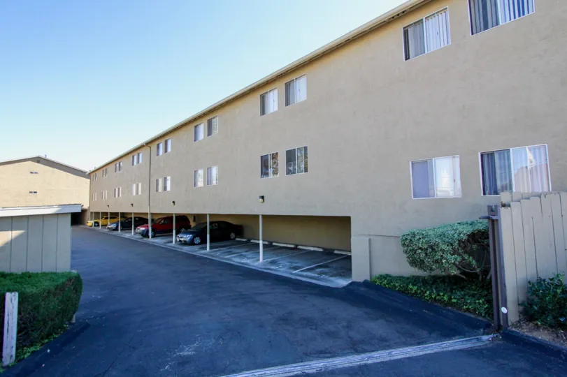 Two level apartment building with lower level garage in Presidio Park in College Area, California.