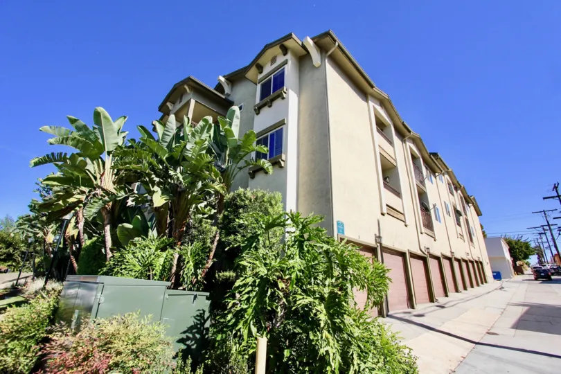 A light colored 3 story unit located at Summit Place of College Area, California