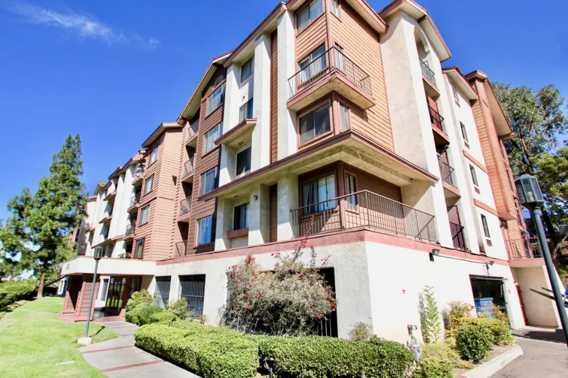 A sunrise Point condominium building located at College Area CA