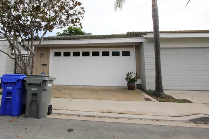 Garages attached to homes at Bahama Village in Coronado California