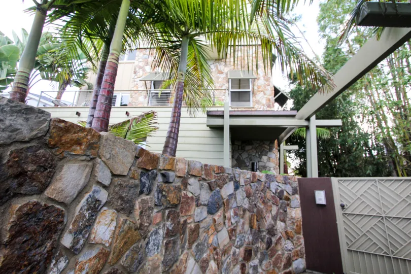 Security wall with gate at Bridgend Lanai in Coronado California