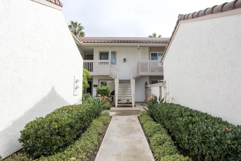 White color building in California State in Community of Coronado Cays in city of Coronado during daytime with blue sky