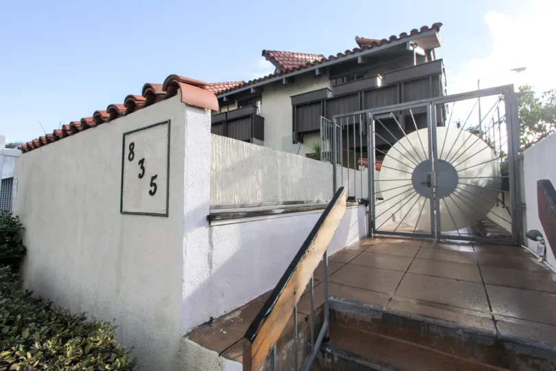 Walkway near gated residencd at Garden Of The Sun in Coronado California