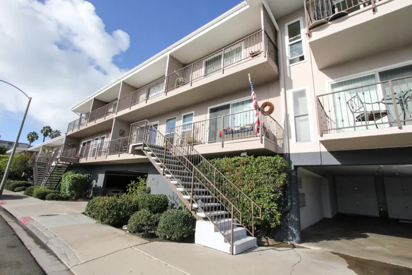 Three story housing with attached stairway at Glorietta Bay in Coronado California