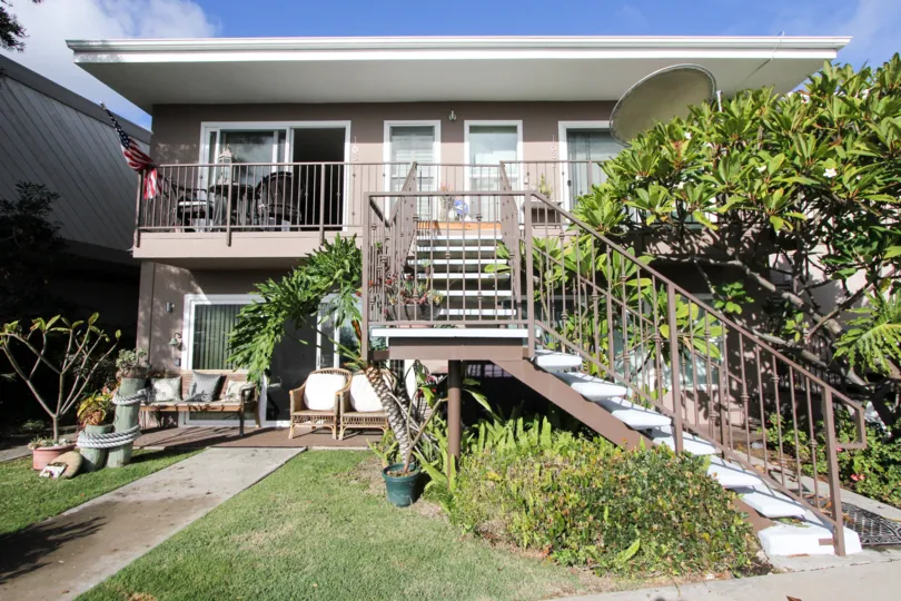 Retro apartment in a beach community. Tropical landscaping.