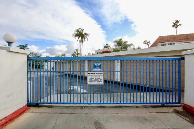 Gate to gated community in warm location with parking lot