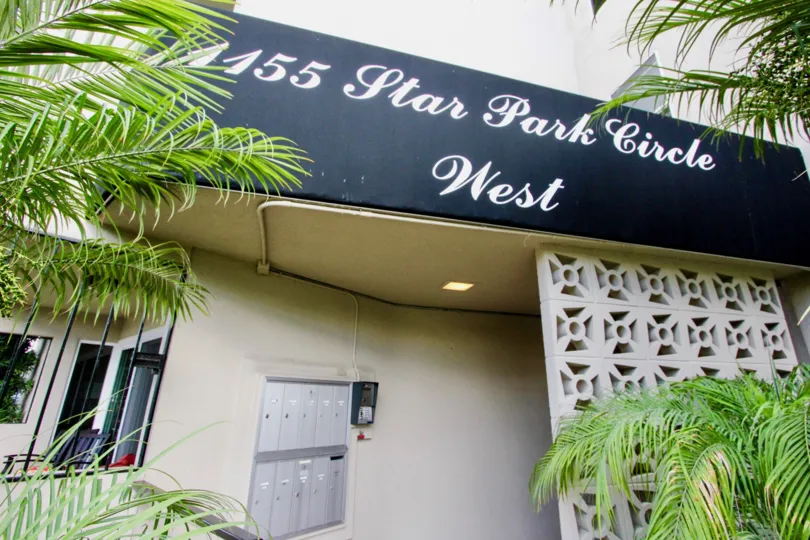 In Star Park Condos has a board and postal box with plants