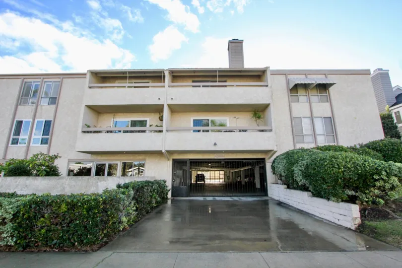 Three story residential units with underground parking at Villa Corona in Coronado California