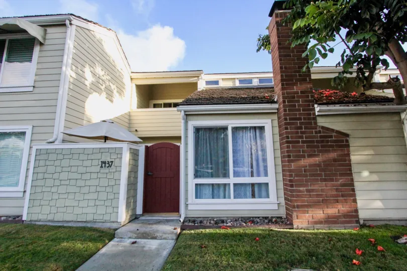 A bright looking home on a sunny day located in Village townhomes.