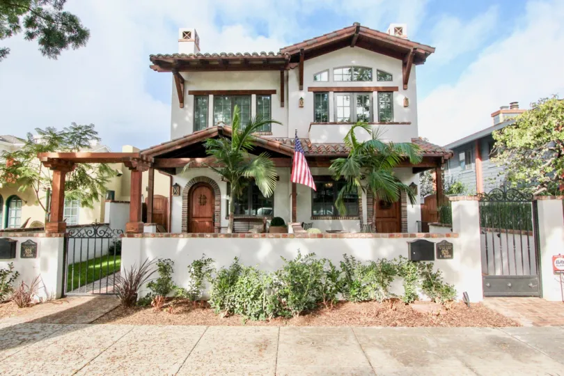 Outer view of the building in Villas with street view of house and garden.