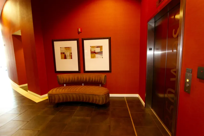 The red walled interior by the elevators at 350 West Ash