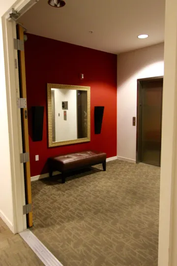 A beautiful red and wight color lift rest room in the 350 West Ash