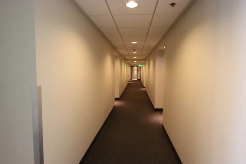 the inside of hotel in caledor has door of rooms light on now