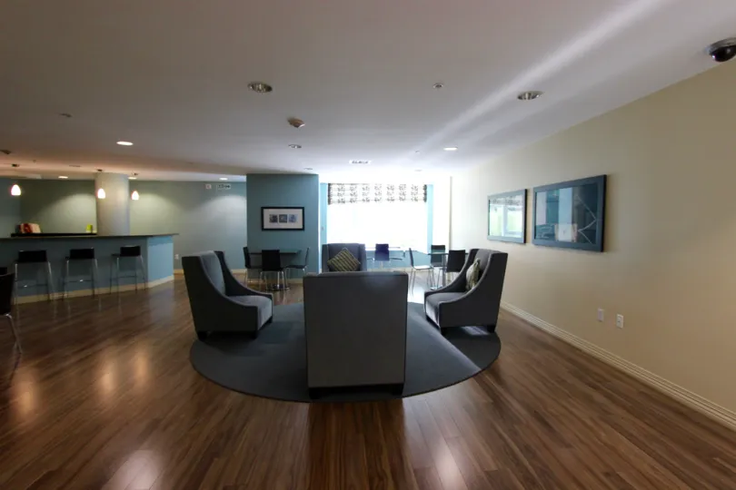 Sitting area with modern style chairs and hardwood floors in the Alicante community of Downtown San Diego, California