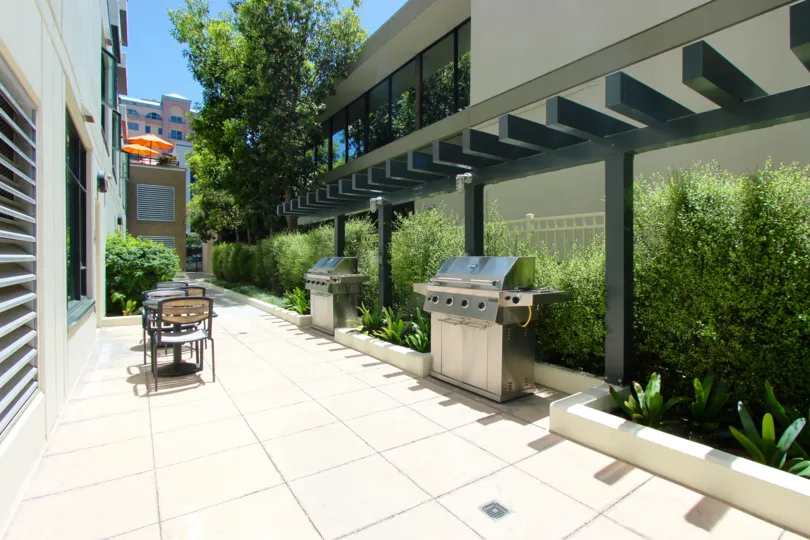 Grills and Tables in the Outdoor BBQ Area of the Alicante Condos in the Banker's Hill Neighborhood of Downtown San Diego, CA