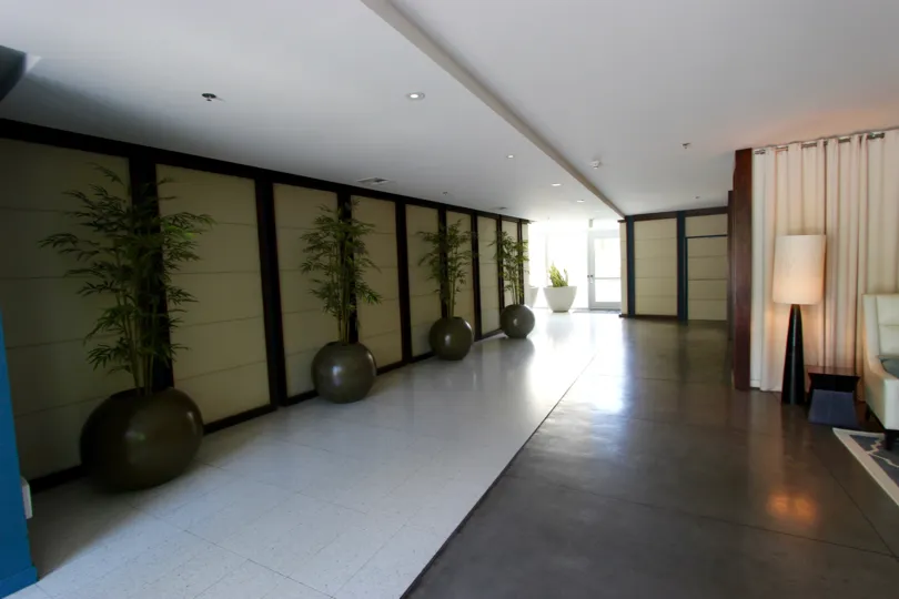 The hallway of a loft with trendy modern decor in Downtown San Diego, California