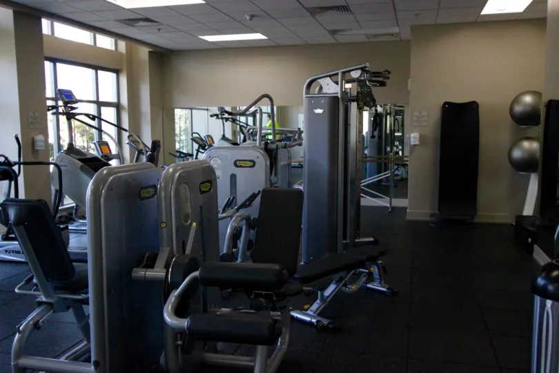 Weight machines and treadmills in Alta fitness center, San Diego, CA