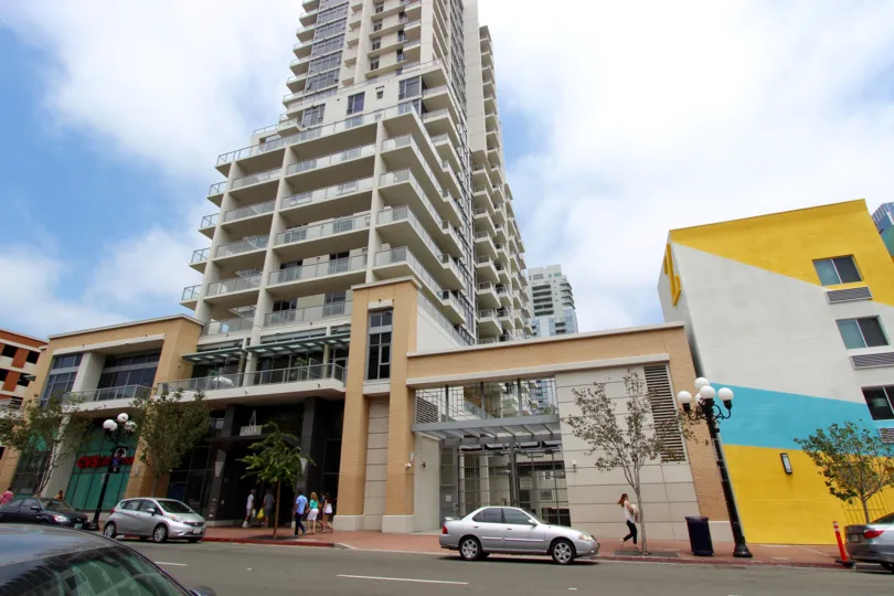 A street view of a modern apartment complex with porches in Atla