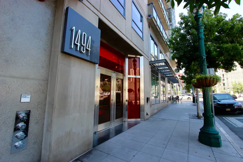 A view on the street in Aperture neighborhood, an entrance of a building