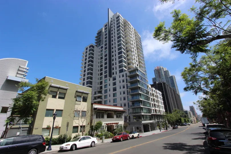Tall building against a clear, blue sky in the Aria community of Downtown San Diego, California