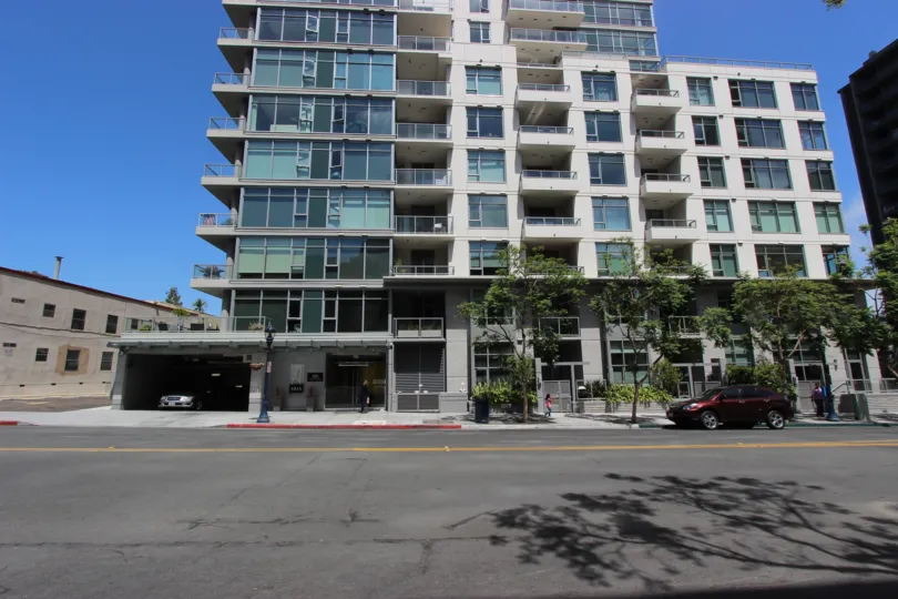 A glass building front in an apartment building in Aria Downtown San Diego CA