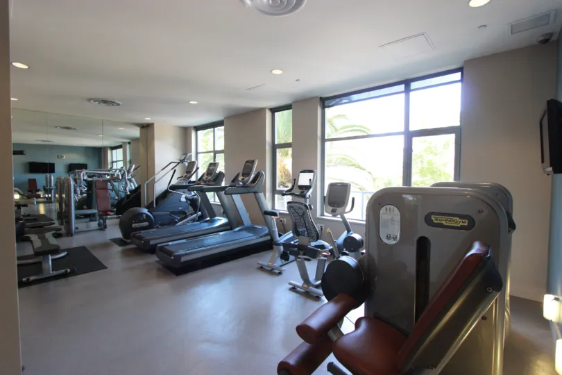 Two treadmills, and stationary bikes look out over the city at Aria.